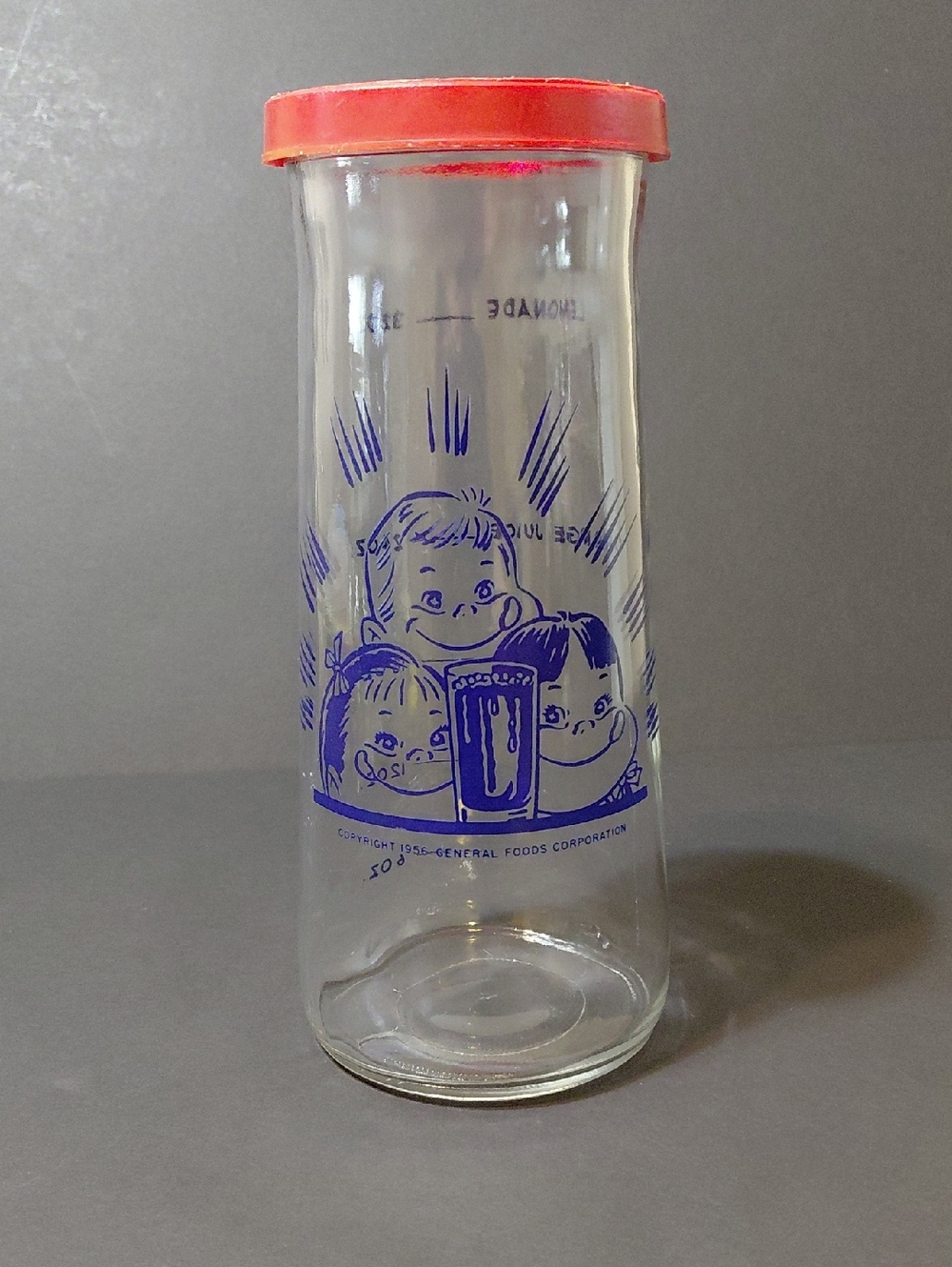 Vintage 1956 General Food Corp 32 oz Glass Juice Decanter with Red Plastic Lid